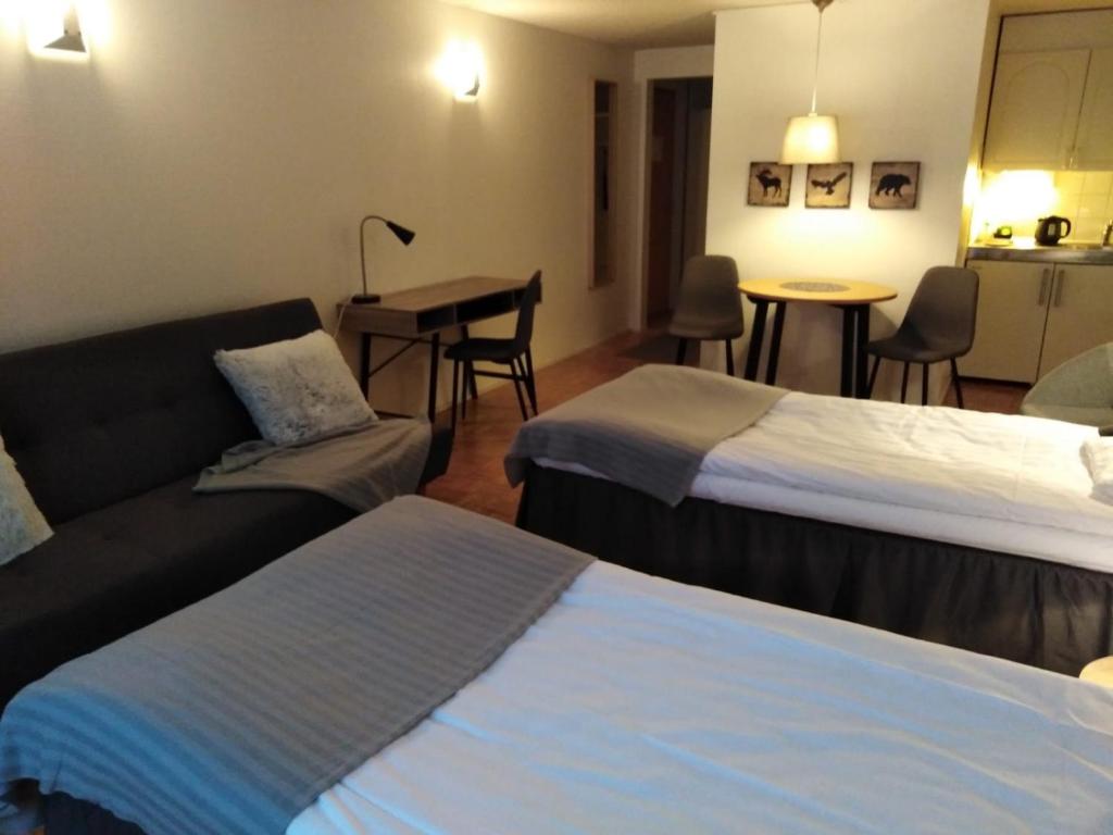 Postel nebo postele na pokoji v ubytování Hotel Yöpuu