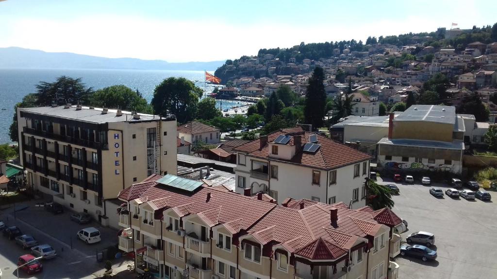 an aerial view of a city with buildings and the water at Vasilij Lake view in Ohrid