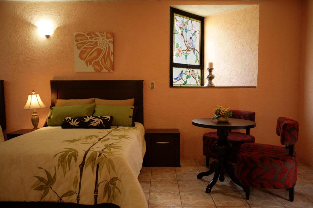 Lova arba lovos apgyvendinimo įstaigoje Hotel Finca Las Hortensias