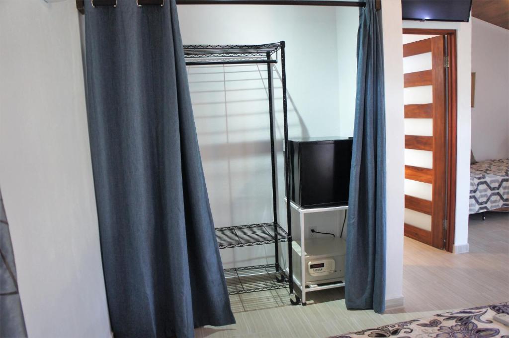 TV a/nebo společenská místnost v ubytování Casa Donna Rosa B&B