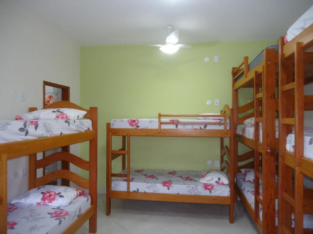 Postel nebo postele na pokoji v ubytování Harmoni Hostel & Pousada