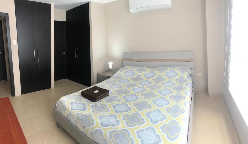 Postel nebo postele na pokoji v ubytování 1310 Luxury Room near of the Airport - Edificio Kennedy Town Center #403