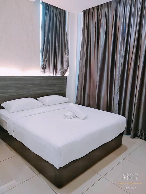 Postel nebo postele na pokoji v ubytování KU-3 HOTEL