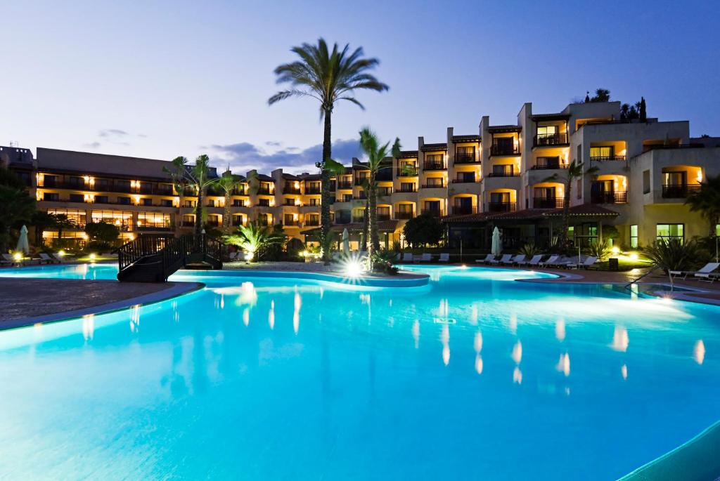
a hotel room with a large pool of water at Precise Resort El Rompido-The Hotel in El Rompido
