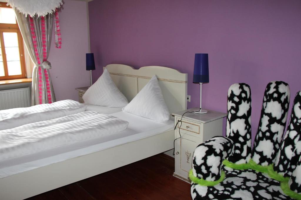 Postel nebo postele na pokoji v ubytování Hotel Turmdieb