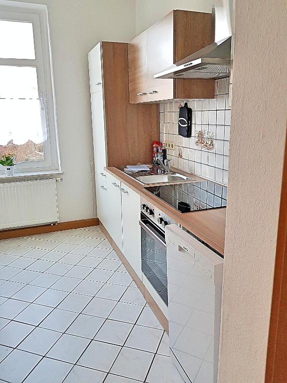 Kuchyň nebo kuchyňský kout v ubytování Ferienwohnung "Alte Fleischerei" Freiberg Sachsen