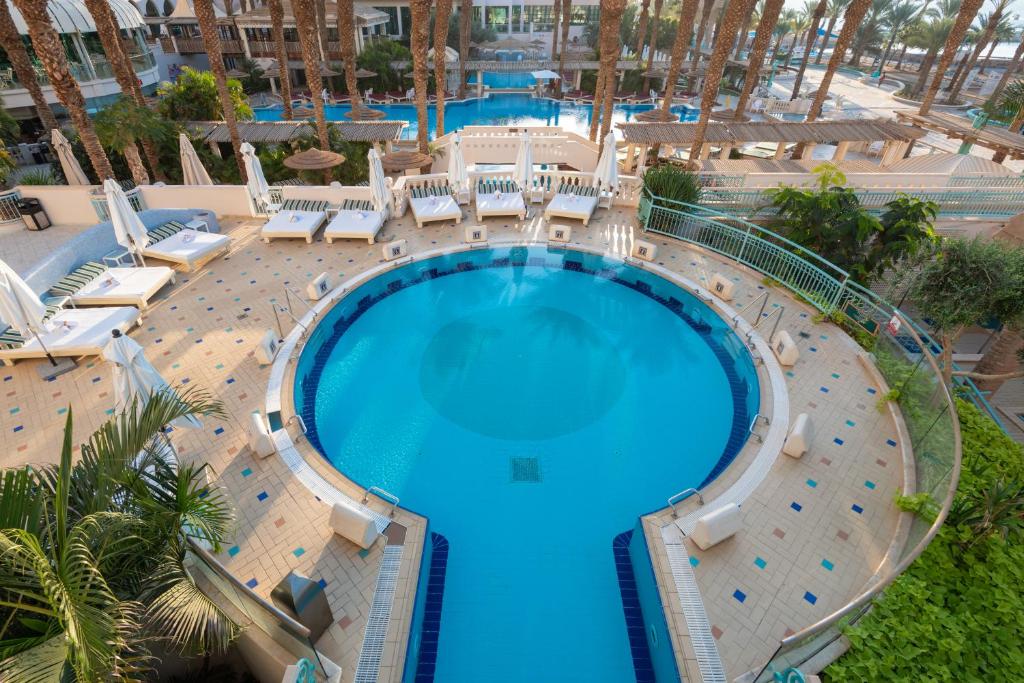 Bazén v ubytování Herods Vitalis Spa Hotel Eilat a Premium collection by Fattal Hotels nebo v jeho okolí