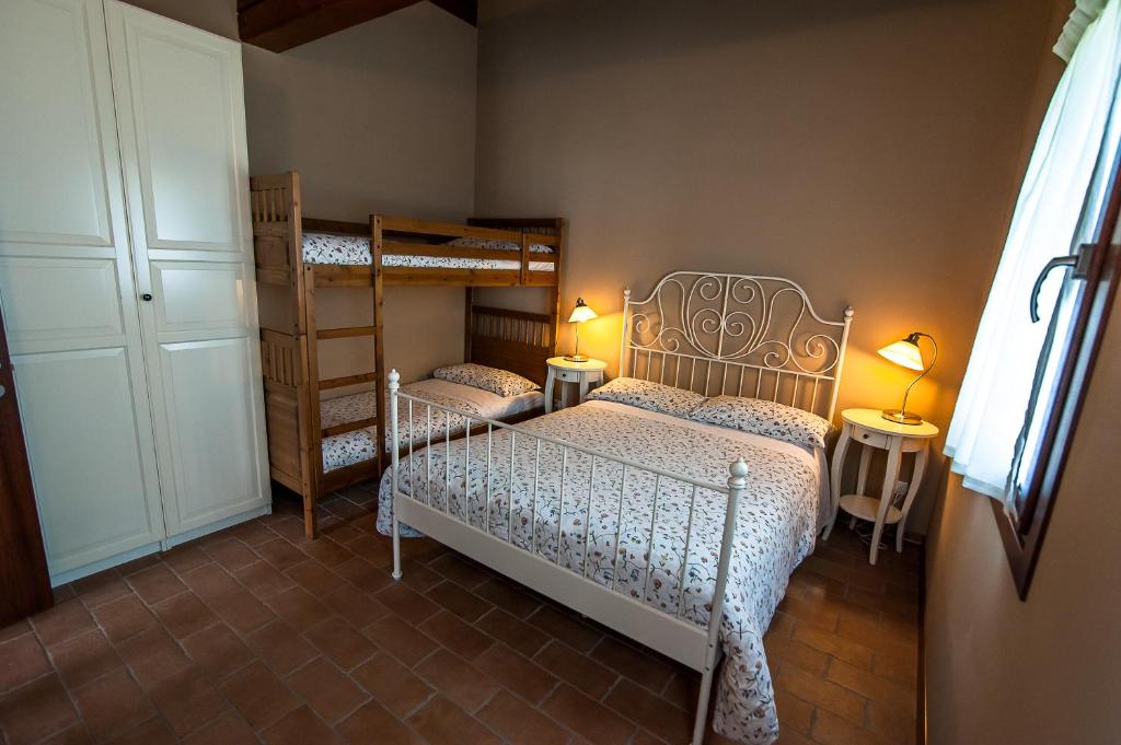 Postel nebo postele na pokoji v ubytování Particolari del Brenta