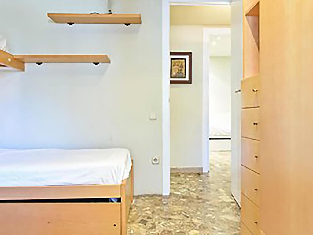 Postel nebo postele na pokoji v ubytování APARTMENT SALOU MAIN BEACH