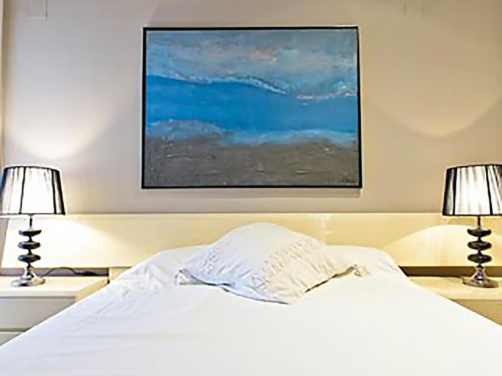 Postel nebo postele na pokoji v ubytování APARTMENT SALOU MAIN BEACH