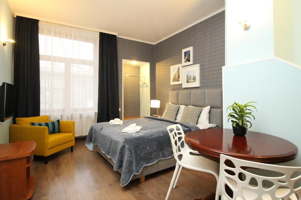 Postel nebo postele na pokoji v ubytování Tallinn City Apartments Residence