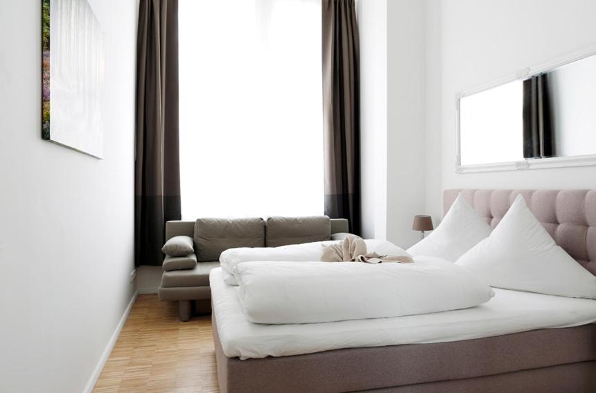 Posezení v ubytování SC 04 by ROCKCHAIR Apartments l SUPERHOST Status l 4 Bedrooms Boxspringbeds 2 Bathrooms Balcony Elevator - Cozy Family & Business Flair welcomes you!