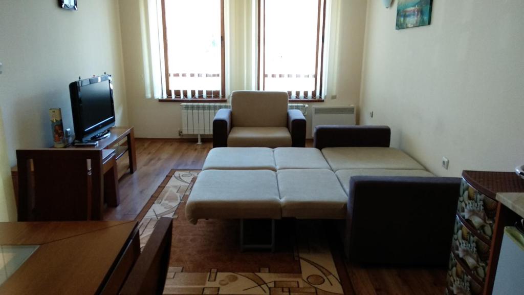 TV a/nebo společenská místnost v ubytování Ski Apartment D50 Cedar Lodge 4