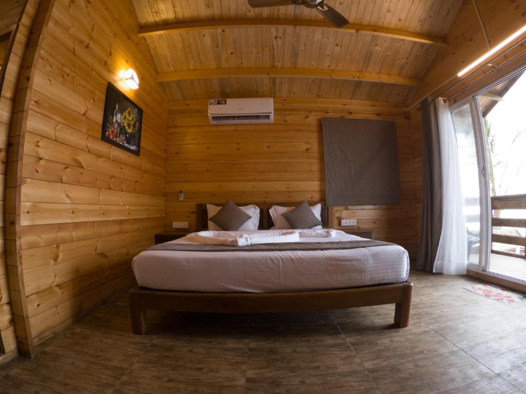 Postel nebo postele na pokoji v ubytování Vista Praia Beach Resort