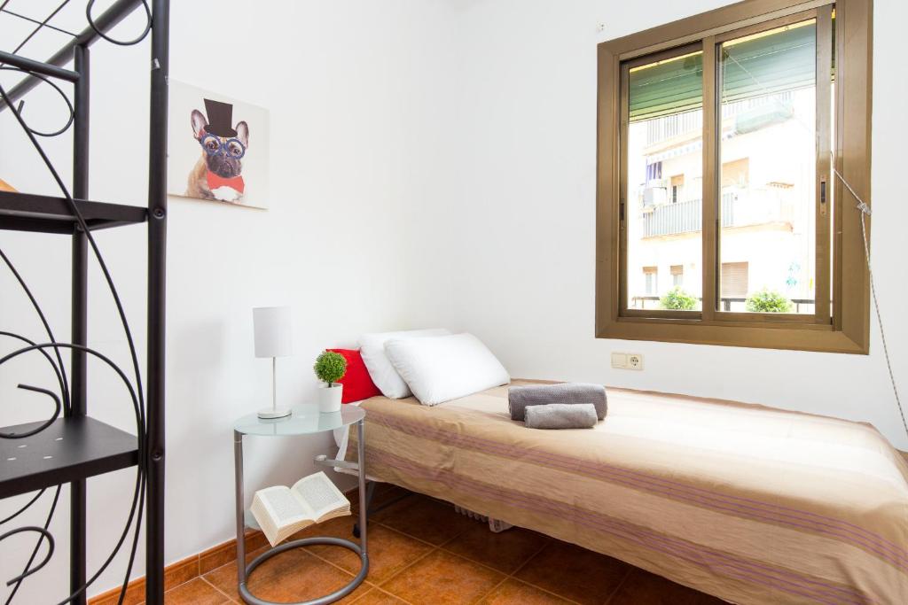 Postel nebo postele na pokoji v ubytování Key Sagrada Familia - Carrer Del Clot