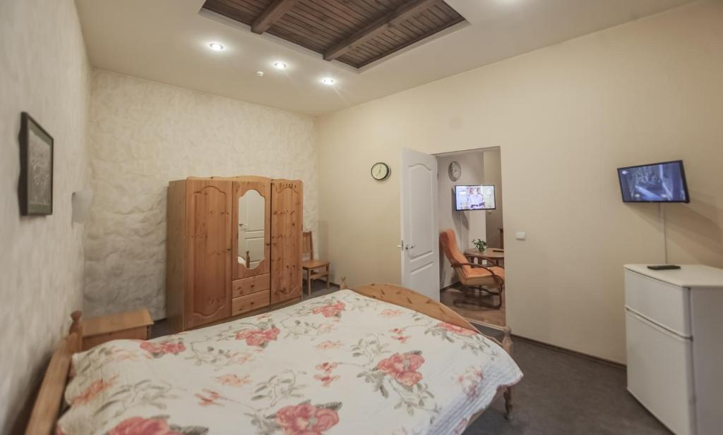 Postel nebo postele na pokoji v ubytování Leo