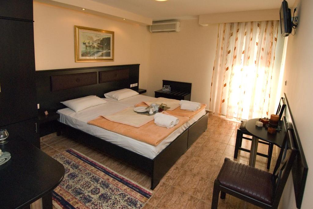 Postel nebo postele na pokoji v ubytování Hotel Dias