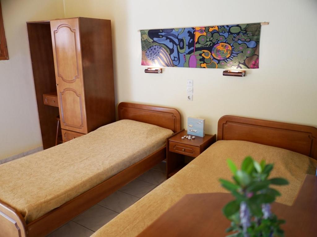 Postel nebo postele na pokoji v ubytování Marios Studios