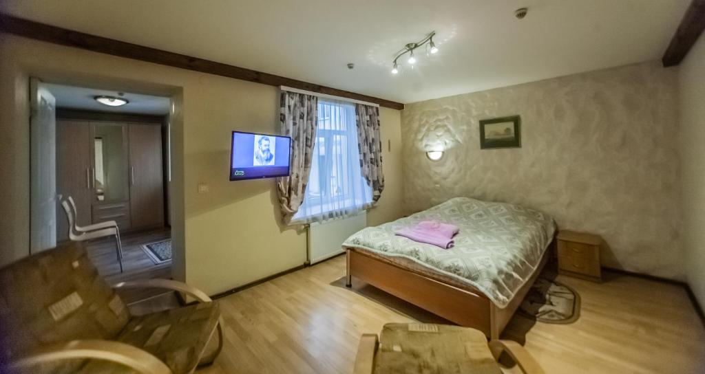 Postel nebo postele na pokoji v ubytování Leo