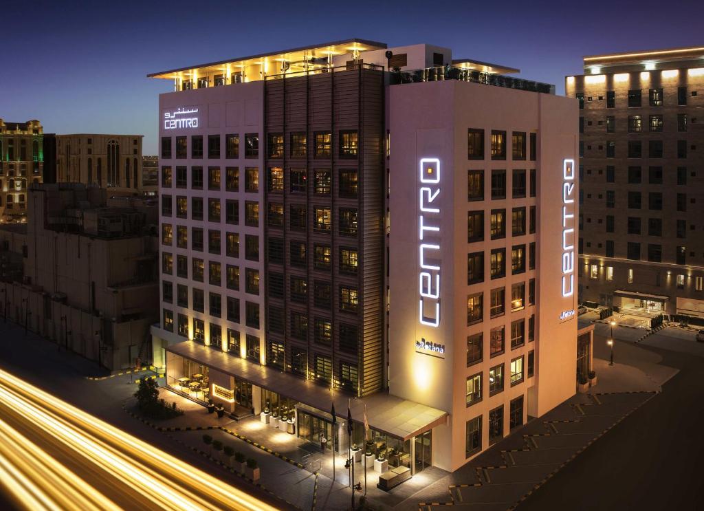a rendering of a hotel building at night at Centro Olaya by Rotana in Riyadh