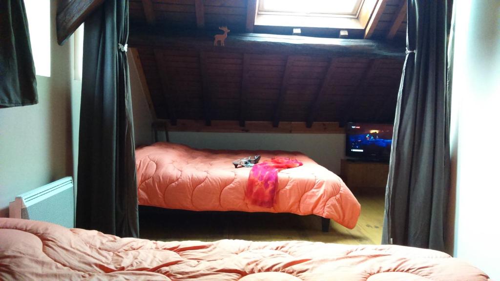 Postel nebo postele na pokoji v ubytování spa et sauna