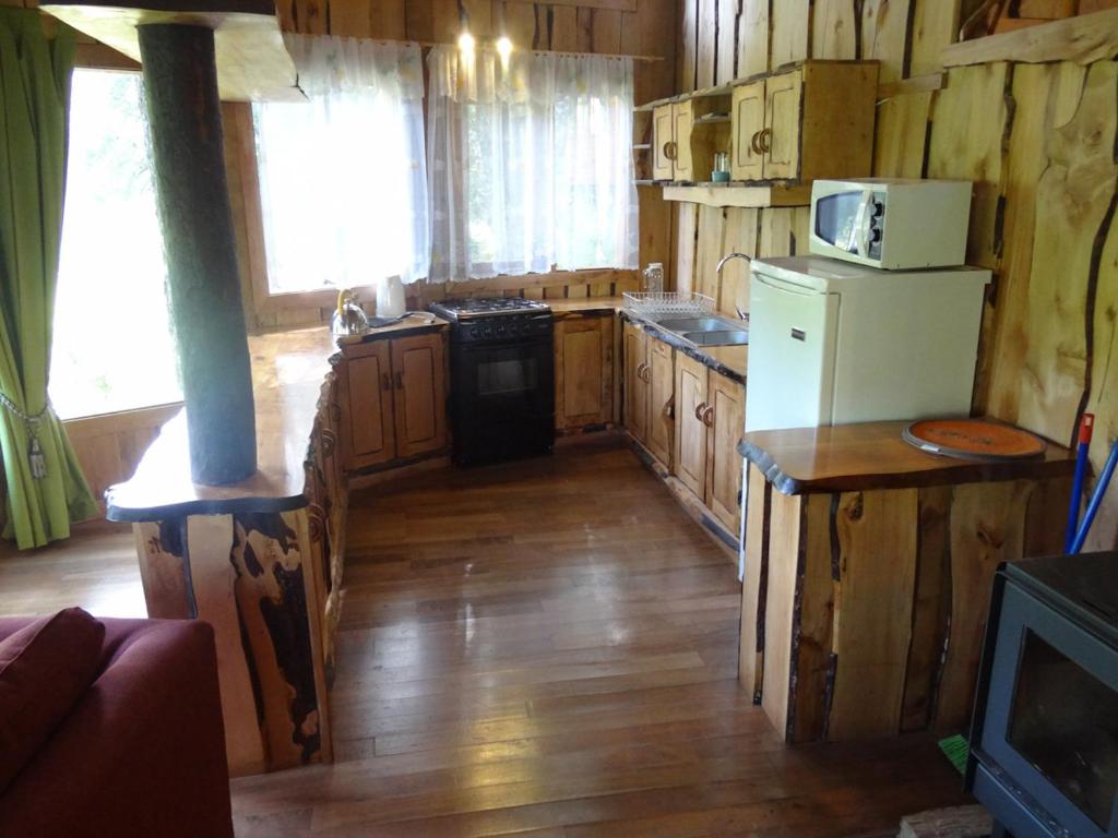 Kuchyň nebo kuchyňský kout v ubytování Patagonia Mawida