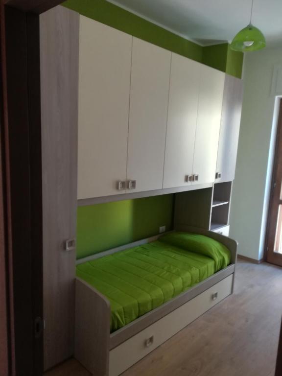 Łóżko lub łóżka w pokoju w obiekcie Casa Giulia Vacanze