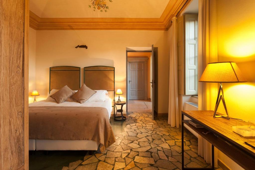 Postel nebo postele na pokoji v ubytování Borgo Ramezzana Country House