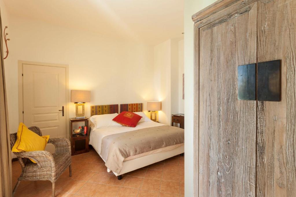 Postel nebo postele na pokoji v ubytování Borgo Ramezzana Country House