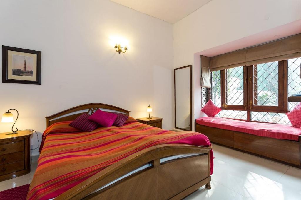 Postel nebo postele na pokoji v ubytování Eleven Bed & Breakfast