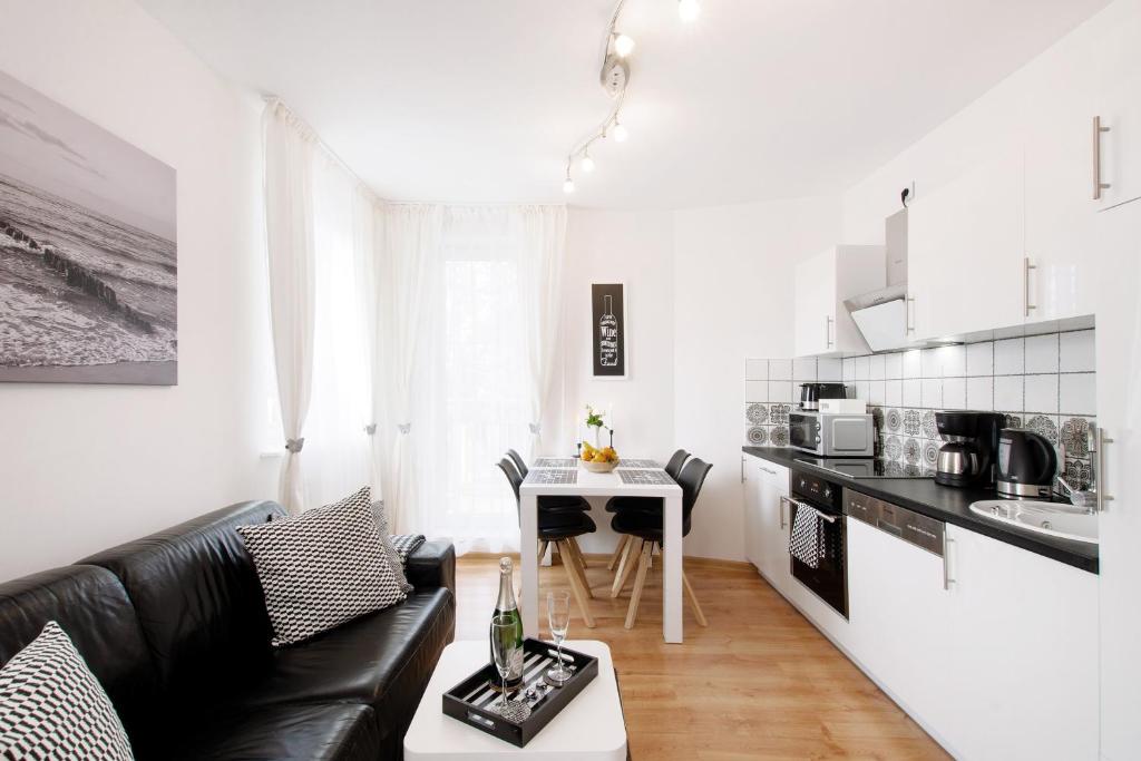 Kuchyňa alebo kuchynka v ubytovaní Familien Appartement "Ostsee Perle" neu & modern