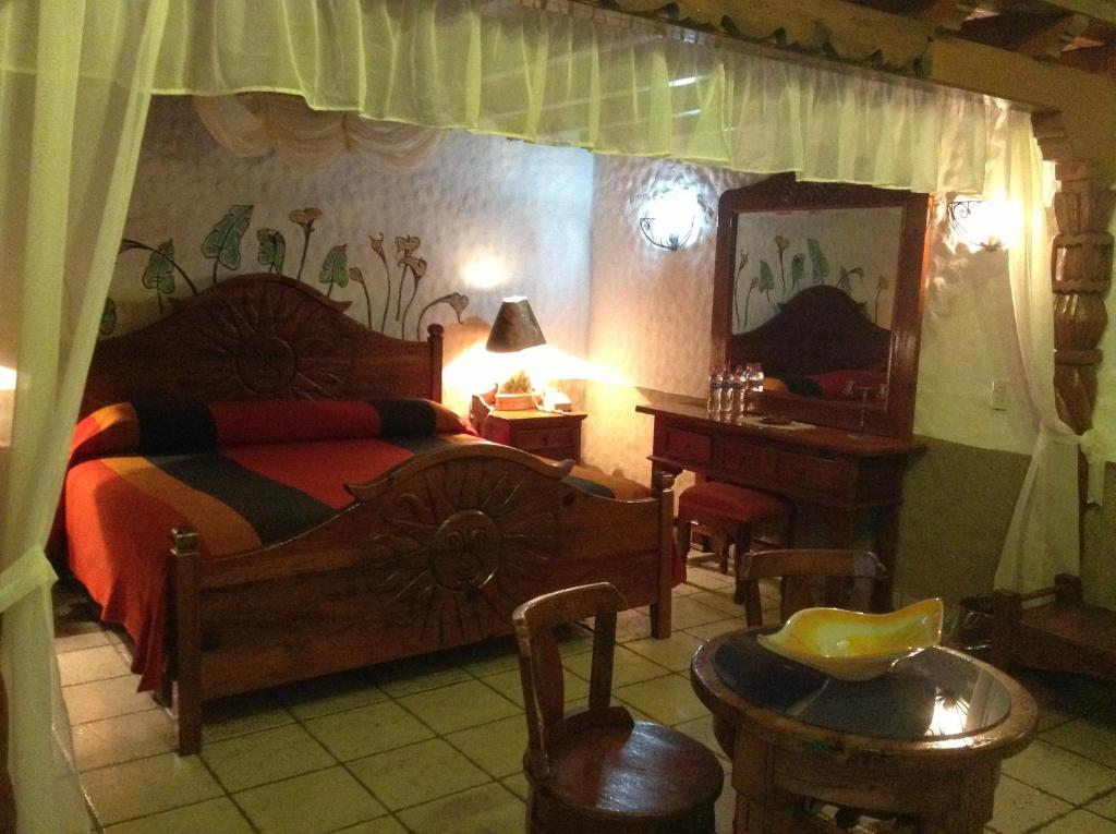 Posezení v ubytování Hotel Los Escudos