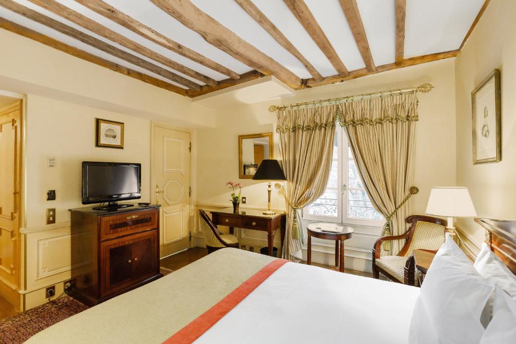 Postel nebo postele na pokoji v ubytování Hotel Luxembourg Parc