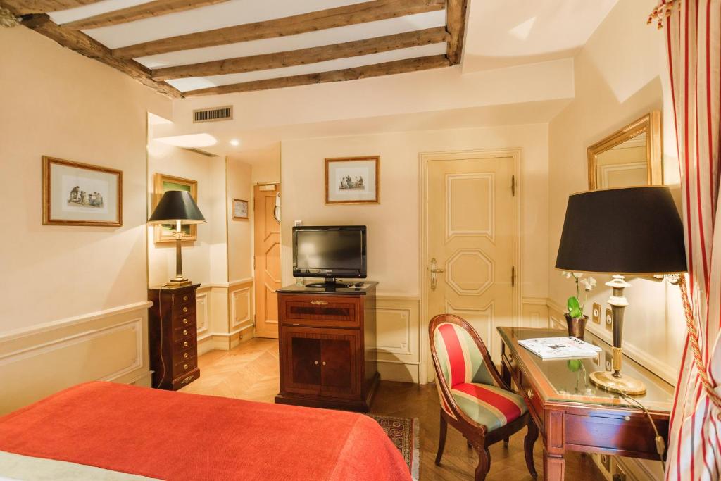 TV a/nebo společenská místnost v ubytování Hotel Luxembourg Parc