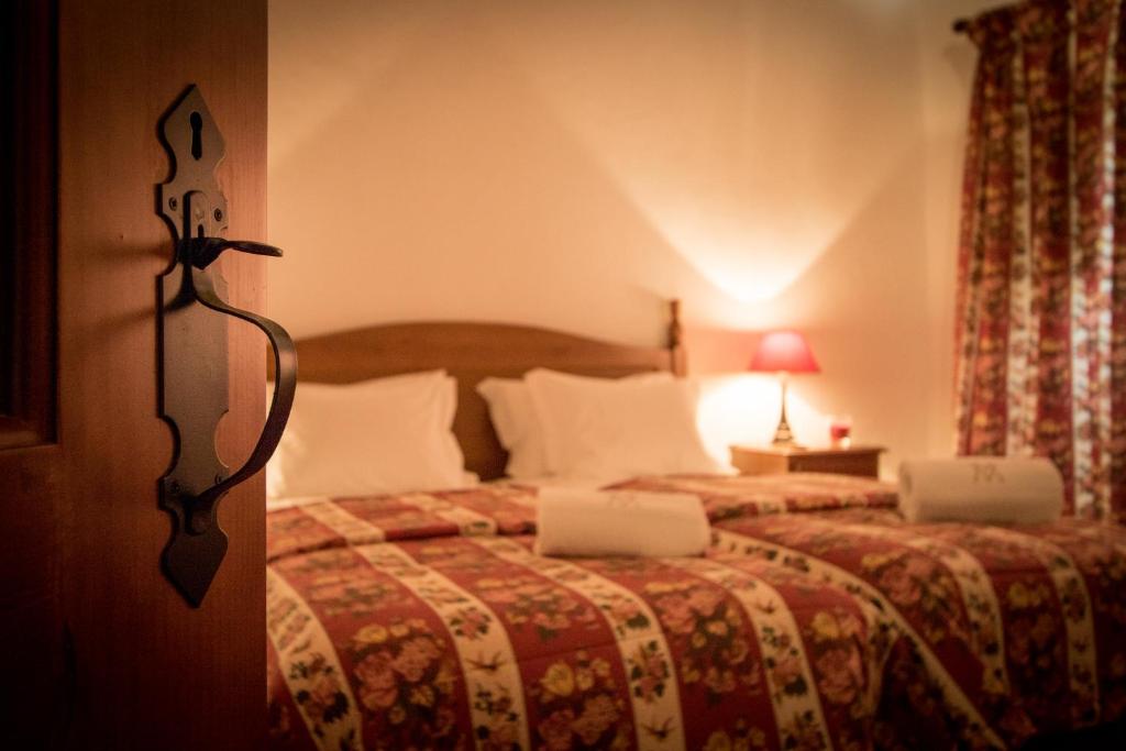 Postel nebo postele na pokoji v ubytování Casas da Piedade