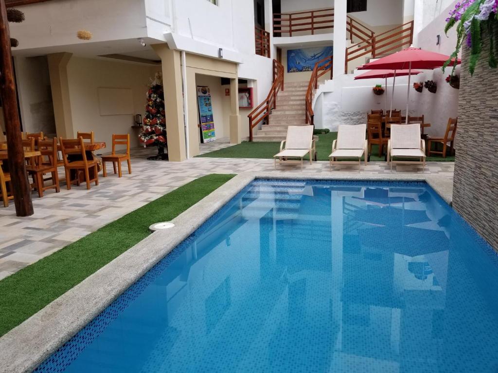 Bazén v ubytování Hostal España nebo v jeho okolí