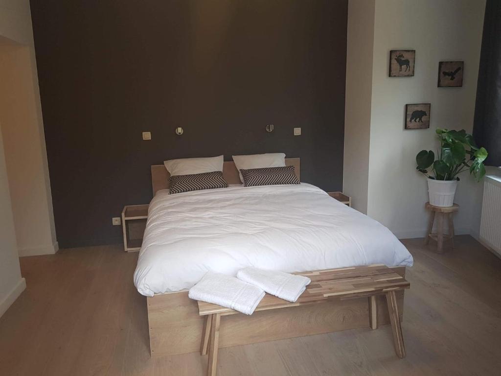 Postel nebo postele na pokoji v ubytování Au sommet de la cascade
