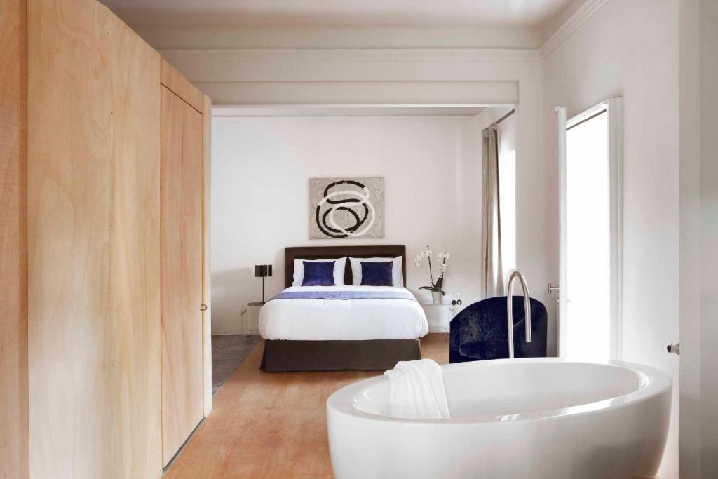 Cama o camas de una habitación en Box Art Hotel - La Torre