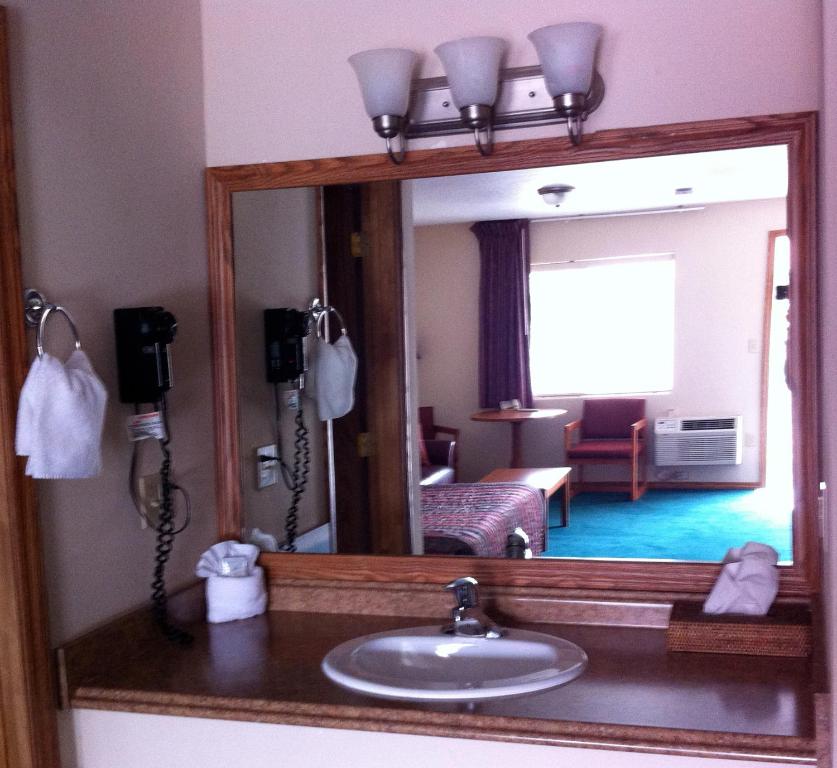 Koupelna v ubytování Legacy Inn