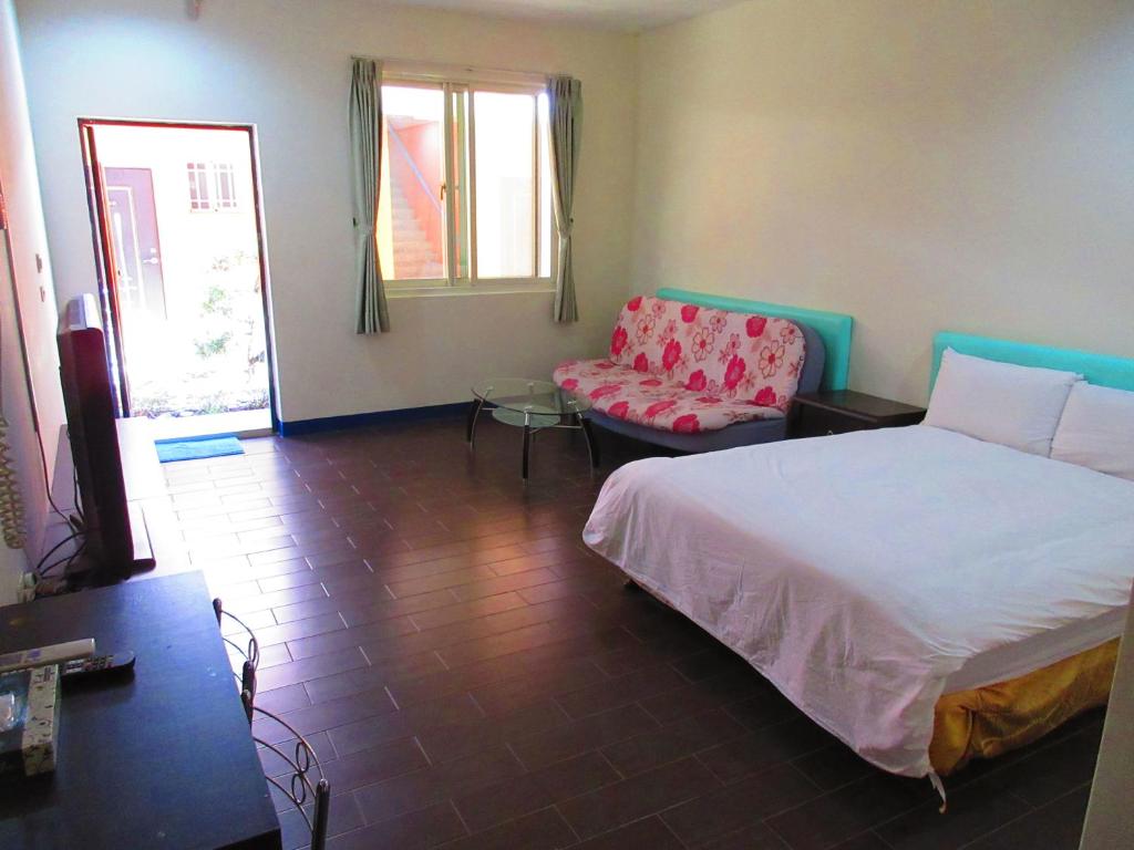 Postel nebo postele na pokoji v ubytování Ivan Garden B&B