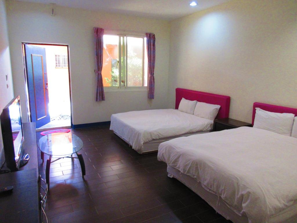 Postel nebo postele na pokoji v ubytování Ivan Garden B&B