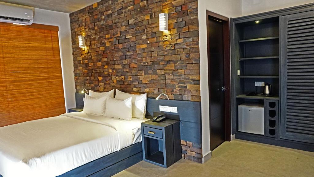 Postel nebo postele na pokoji v ubytování Hotel Sico
