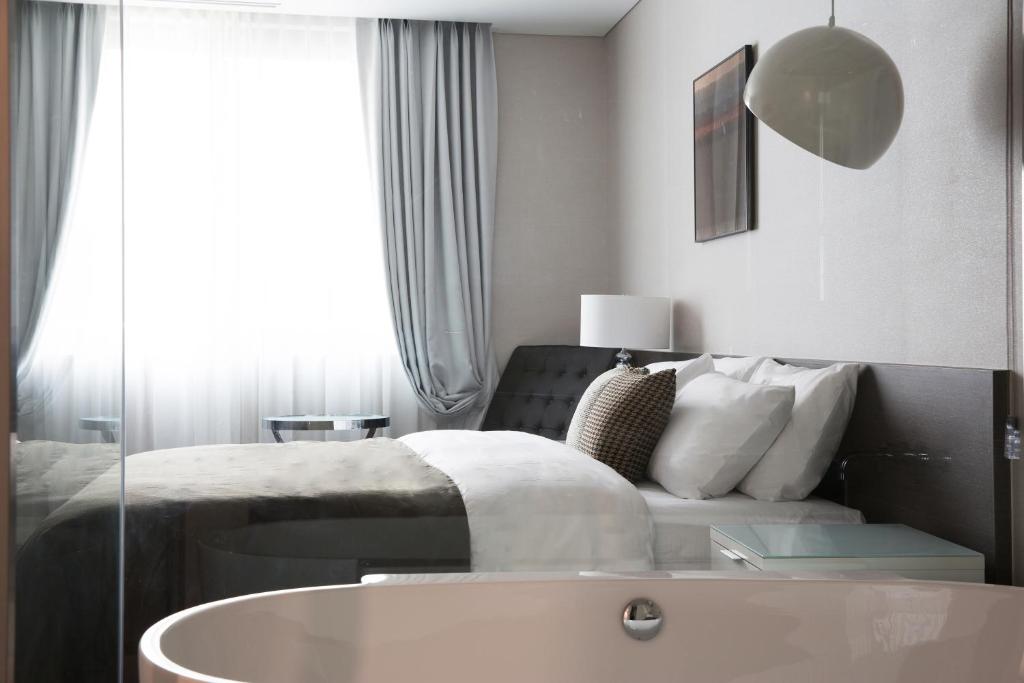 Postel nebo postele na pokoji v ubytování Hotel Mate Bundang