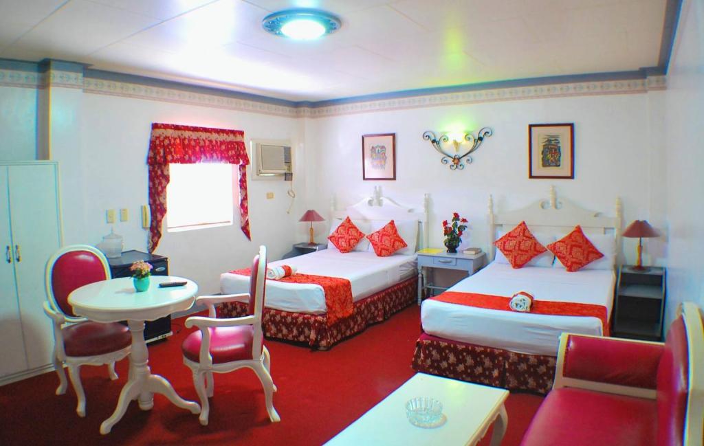 Postel nebo postele na pokoji v ubytování SM Travelodge