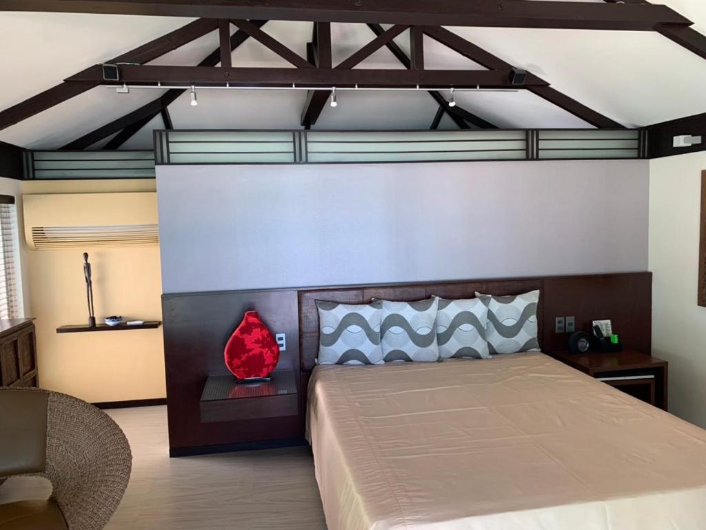Postel nebo postele na pokoji v ubytování Boracay Beach Houses