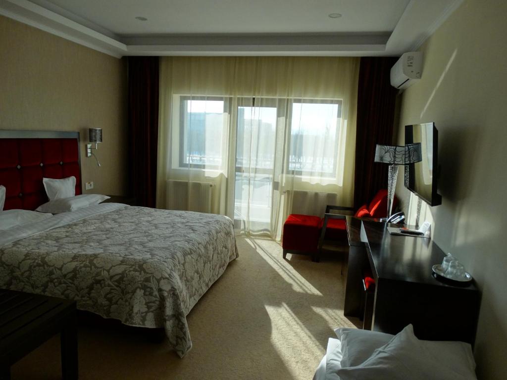 
Double Room with Balcony (2 Adults + 1 Child)
