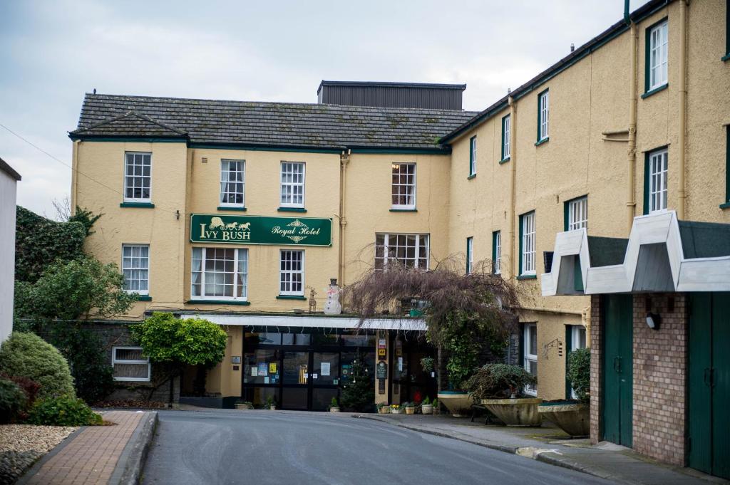 an empty street in front of a building at Ivy Bush Royal Hotel by Compass Hospitality in Carmarthen