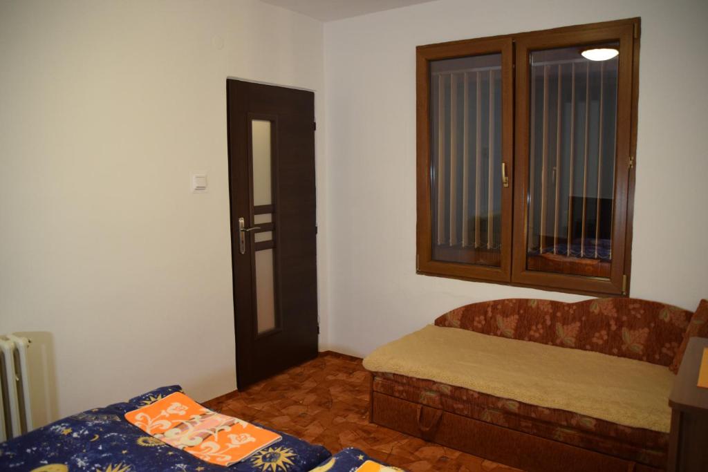 Postel nebo postele na pokoji v ubytování Chata Monika Demänovská Dolina Jasná