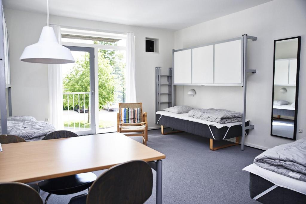 Postel nebo postele na pokoji v ubytování Danhostel Kolding