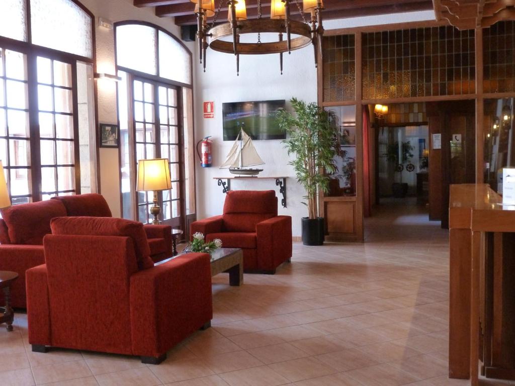 Posezení v ubytování Hotel La Carolina